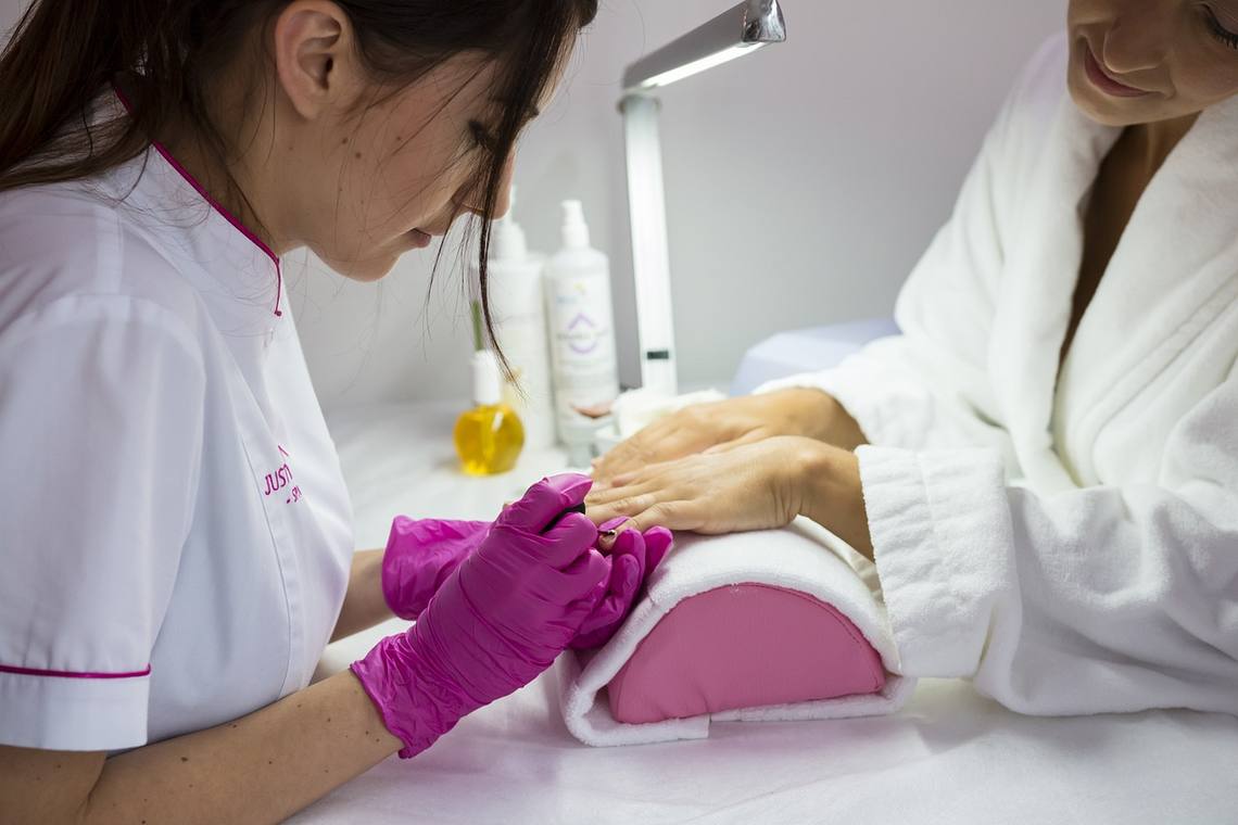 Beautician performing a beauty treatment