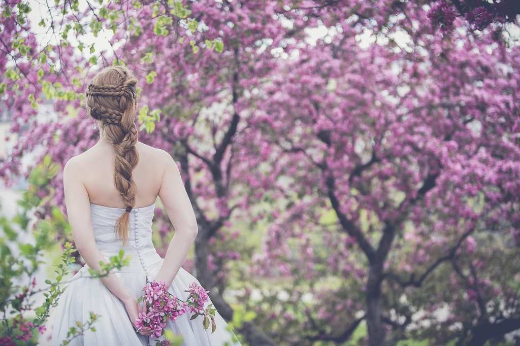 Woman showing off a polished hair style