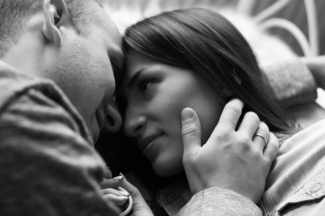 Couple sharing a tender romantic moment